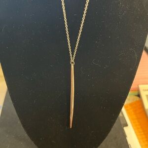 Signed Crave bronze spike necklace measuring approximately 20-25 inches long.